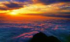 The Setting Sun Kindling the Sky